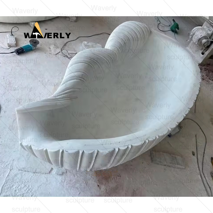 Shell shape marble bathtub