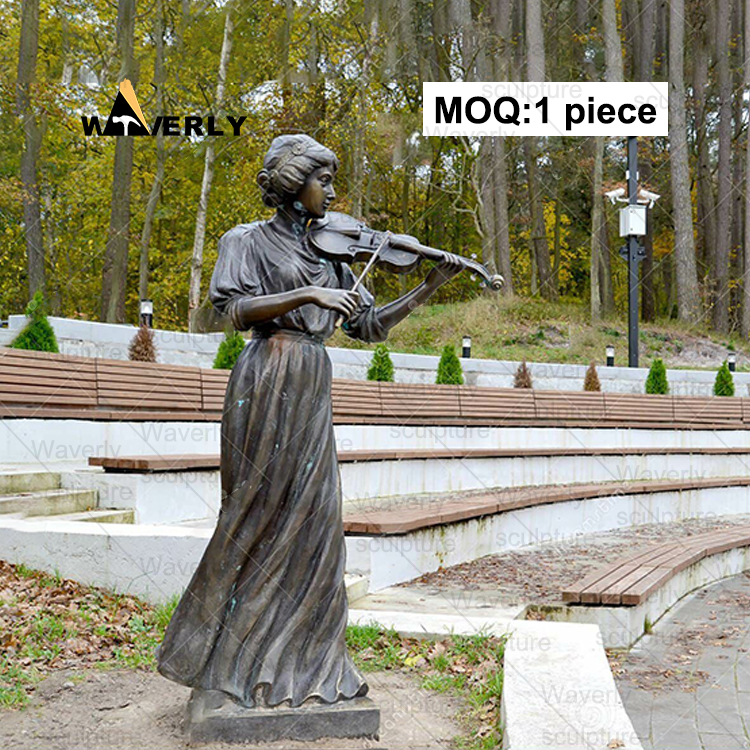 The girl playing the violin by the river statue -Mbk-31306