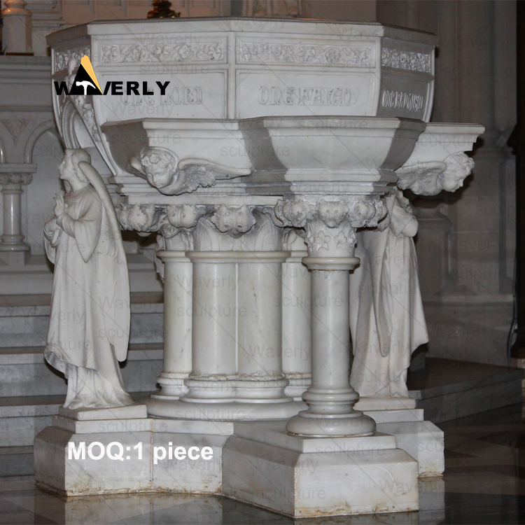 Angels surround the marble baptismal basin -40907